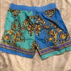 Versace Couture swim trunks for men. Size 52 in Italian. Large in US sizing.